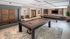 Game room with pool table and shuffleboard