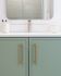 Green cabinets with gold accents