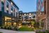 Outdoor courtyard with seating and lawn games