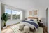 Bright and airy bedroom with modern decor, featuring a large window with scenic views, a cozy bed, stylish abstract artwork, and vibrant indoor plant.