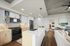 Open concept kitchen with island at Kingston South End apartments