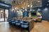 Resident lounge table and seating at Beckon Apartments