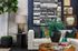 Close up of living room couch with modern art and decor