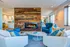 Resident lounge with fireplace and plenty of seating
