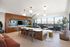 Club Room with Seating and Rolling Hills View