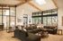 Clubhouse great room with vaulted wood ceilings and large windows at Sonora in Austin, TX