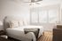 Bright bedroom with neutral decor and large windows at Sonora in Austin, TX