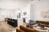 Open-plan home with kitchen, dining area and living room at Sonora in Austin, TX