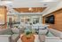 Modern upscale lounge with stylish seating, vibrant patterned walls, and elegant lighting, perfect for socializing and relaxation.