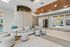 Elegant lobby featuring plush seating, stylish decor, and artistic wall patterns, creating a welcoming and luxurious atmosphere.