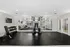 Modern fitness center with state-of-the-art equipment, mirrors, and sleek design perfect for an energizing workout.