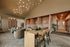 Elegant, modern common area with stylish lighting, comfortable seating, and sleek decor, perfect for relaxation and socializing.