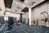 Modern fitness center with state-of-the-art equipment, sleek design, and vibrant lighting.