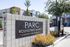 Inviting entrance of PARC Roundtree Ranch Luxury Apartments with modern architectural design and lush landscaping.