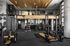 Modern fitness center with state-of-the-art equipment, featuring a spacious layout, sleek design, and panoramic windows.