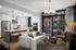 Contemporary living space with an elegant open-plan kitchen, cozy seating area, and large windows letting in abundant natural light.