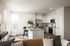 Modern kitchen in a model home at Odell Apartments