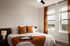 Modern bedroom inside an Odell apartment home