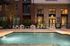 Resort-style pool at Odell Apartments during golden hour