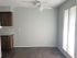 Dining Room w/Ceiling Fan and Faux Wood Flooring