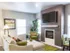 Living room with modern furniture such as a couch, corner chair and table in the corner. Flat screen TV mounted about the fireplace in front of the couch