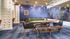 Study lounge with collaborative seating and vibrant wall art