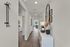 Bright and welcoming entryway with stylish modern touches.