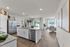 Spacious open-concept layout with modern kitchen and living area.