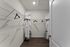 Walk-in closet with ample shelving and storage space.