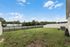 Private fenced-in backyard with room to relax or play.