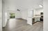 interior pic of deluxe unit with gray planking and white walls