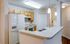Fully equipped kitchen with breakfast bar.