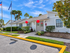 Leasing office exterior at Willow Lake Crossing with updated paint and landscaping.