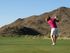 woman playing golf
