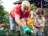 man and child gardening
