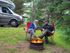 couple outside of a campsite