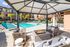 Swimming Pool and Lounge Area with a Firepit