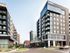 The streets of Denver near our active adult community, featuring the exterior of the Overture 9th + CO apartments.