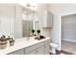 Bathroom with white cabinets