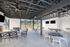 outdoor lounge area with TVs