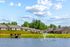 Pond in front of homes