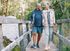 55+ man and woman walking on a trail