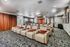 Luxurious home theater room featuring plush recliner seating, elegant decor, and a sophisticated ambiance perfect for entertainment.