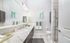 Spacious bathroom with large vanity and modern design