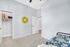 a spare bedroom with a closet