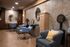 a room with chairs and sinks to style hair for residents