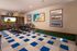 a room with an indoor putting green