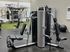 Modern fitness center featuring versatile exercise machinery.