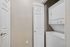 Convenient in-unit laundry with sleek stacked washer and dryer.