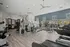 Spacious and modern fitness center with cutting-edge gym equipment and bright natural lighting.
